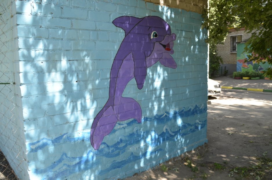Уличное искусство в Днепре: жительница города создает яркие картины на стенах домов - рис. 3
