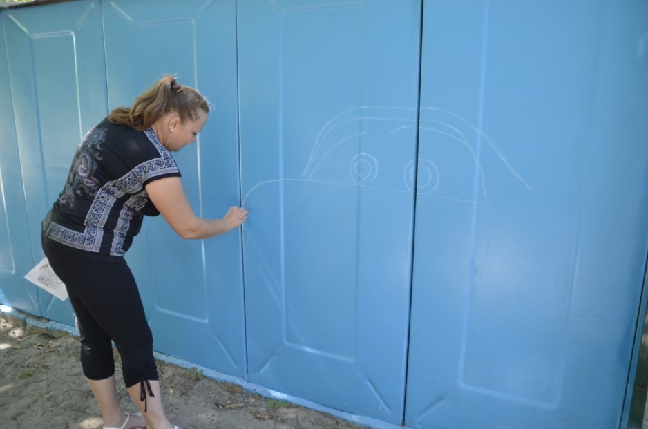 Уличное искусство в Днепре: жительница города создает яркие картины на стенах домов - рис. 6